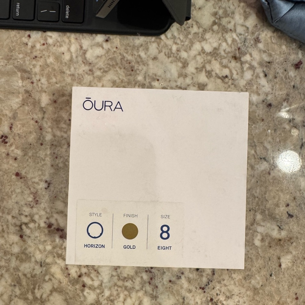 Oura Horizon Gold Ring Gen 3 and Charger